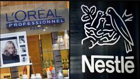 Nestlé estudia vender su participación en L'Oréal