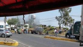 Hieren de bala a reportera que cubría choque entre policía y comuneros en Michoacán