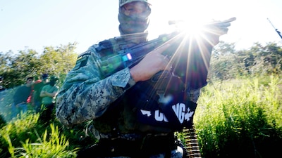 En la imagen, un sicario del CJNG. Los cárteles dijeron al NYT que tuvieron pérdidas tras las medidas de Trump en la frontera (Foto: ESPECIAL/CUARTOSCURO)